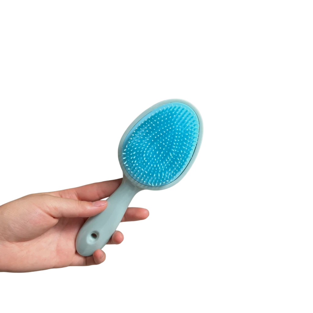 DL STORE Cepillo desenredante azul con mango ergonómico y cerdas de silicona flexibles.