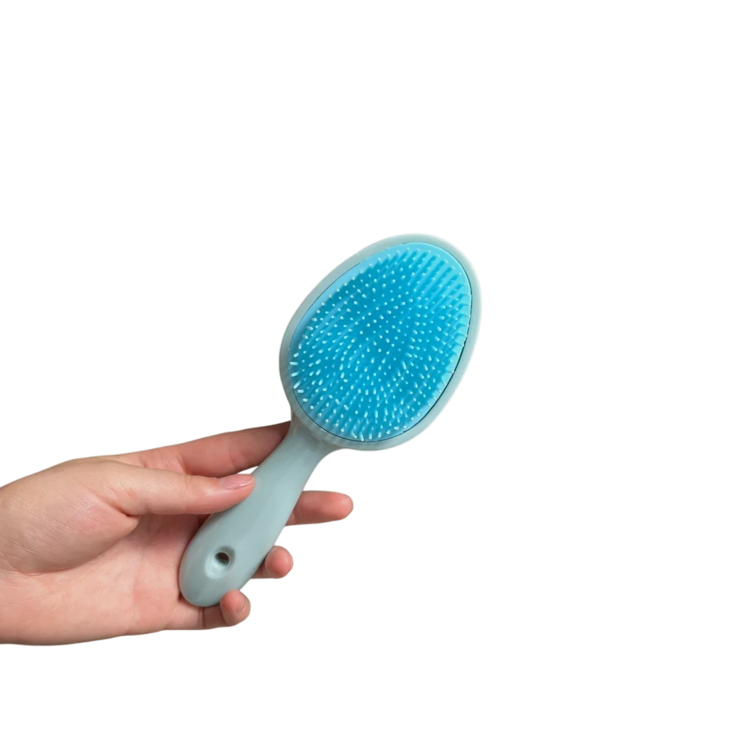 DL STORE Cepillo desenredante azul con mango ergonómico y cerdas de silicona flexibles.
